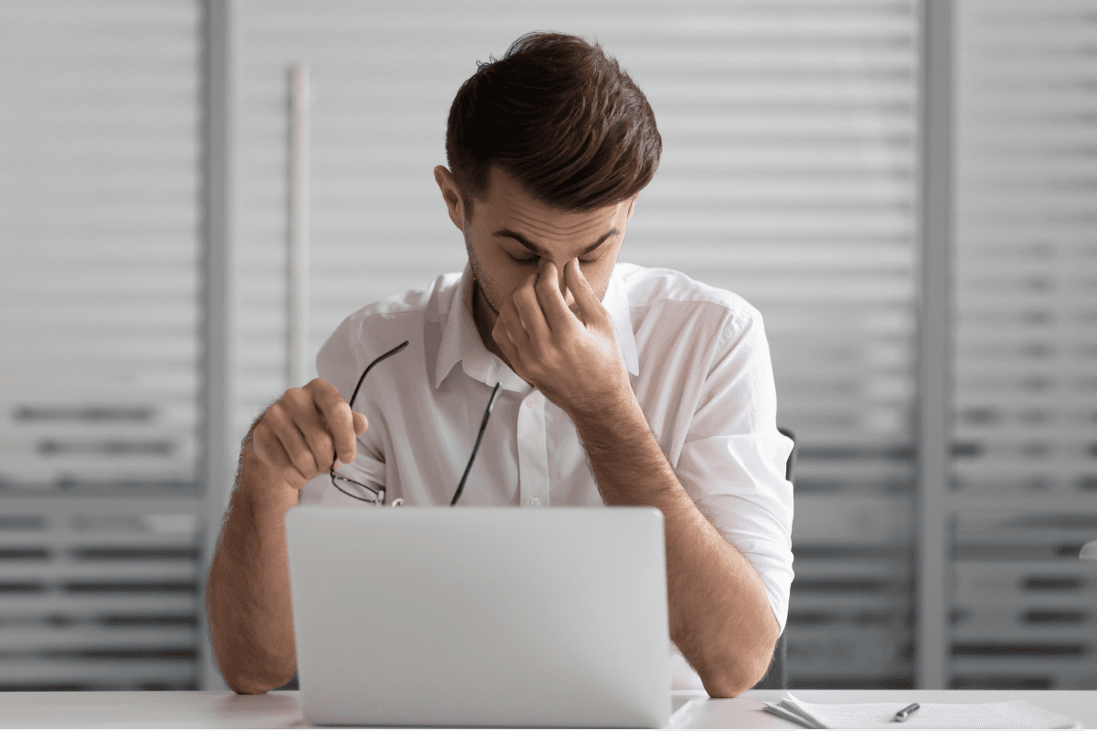 Frustrated team member troubleshooting a broken Odoo system